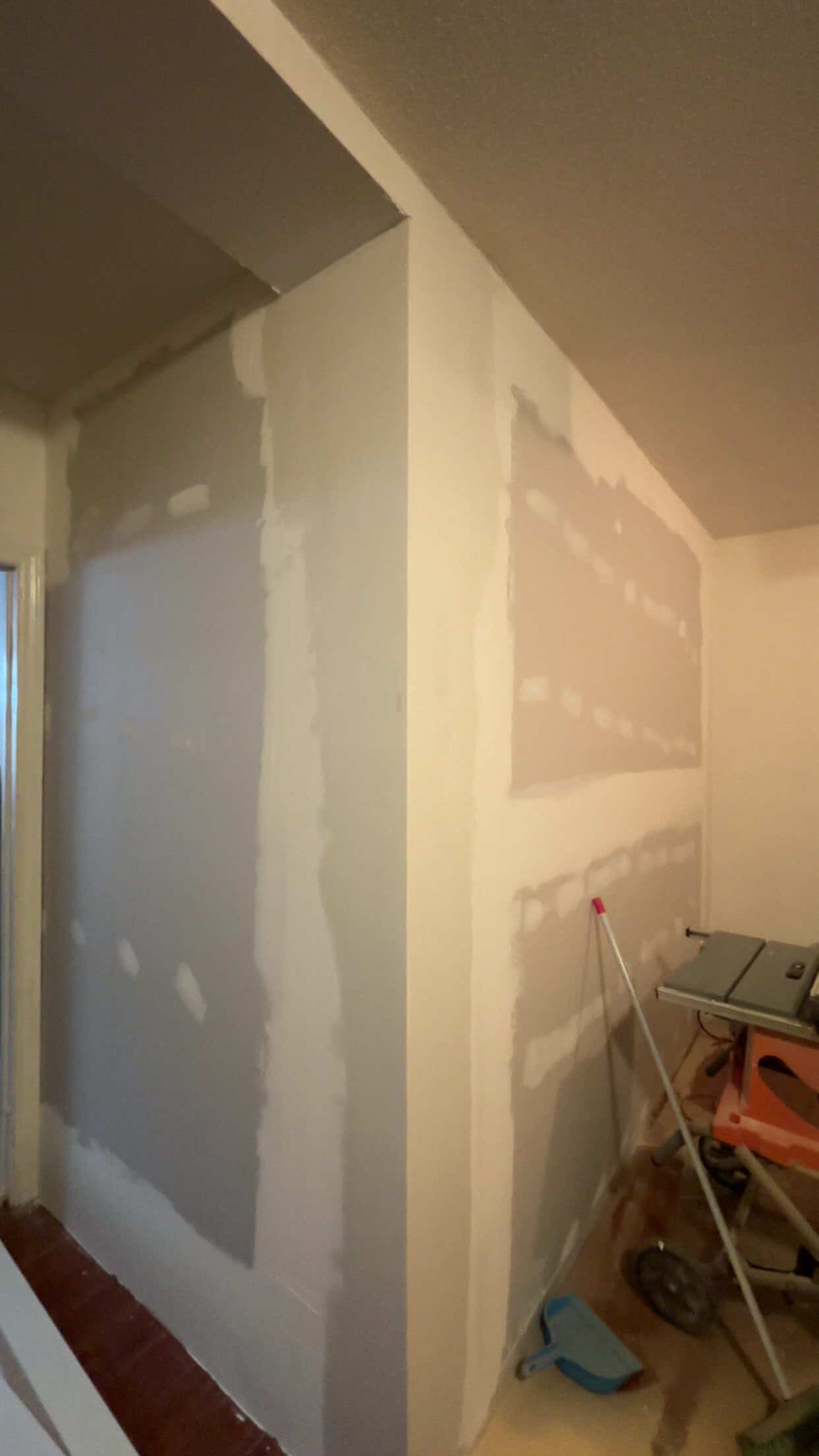 Drywall repair and wall patching before painting